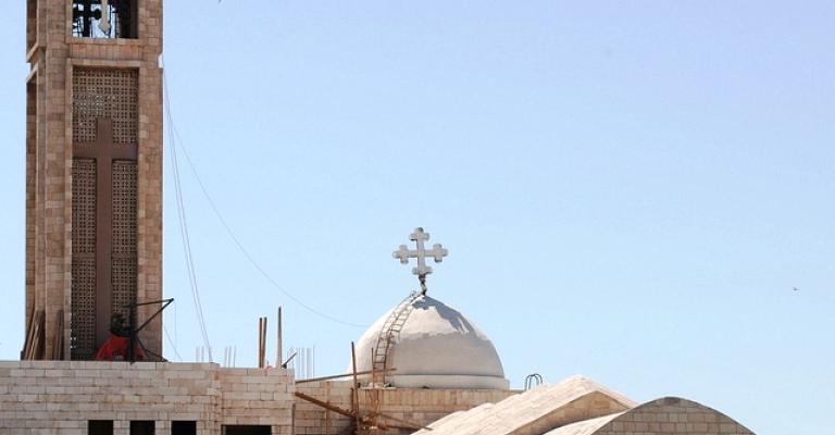 Muslims plant flowers at Behsarah church yard Muslims plant flowers at Behsarah church yard
