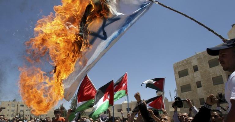 "الوحدة "اللقاء في عمان خدمة "للكيان الصهيوني"