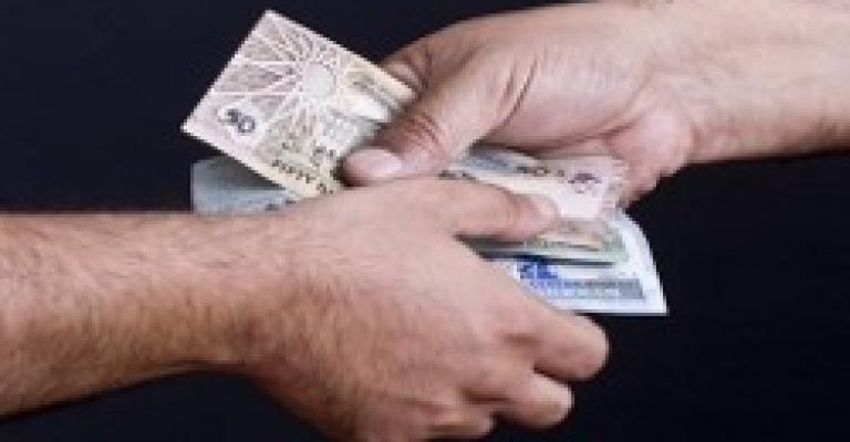 مكافحة الفساد تحبط رشوة بقيمة 65 ألف دينار