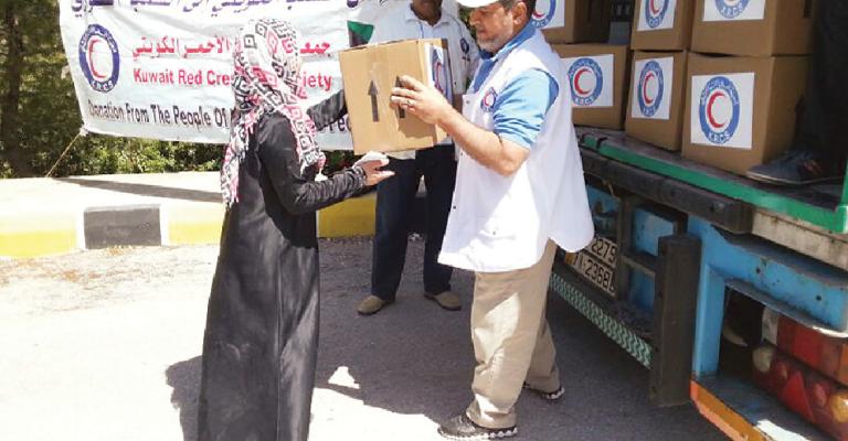 توزيع مساعدات إغاثية على اللاجئين السوريين في معان والعقبة