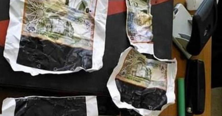 ضبط مشغل تزوير نقود في الكرك