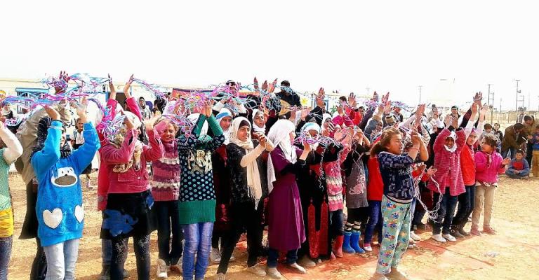 أطفال من مخيم الزعتري يشاركون بفعاليات اليوم العالمي للطفل/ تصوير فراس اللباد