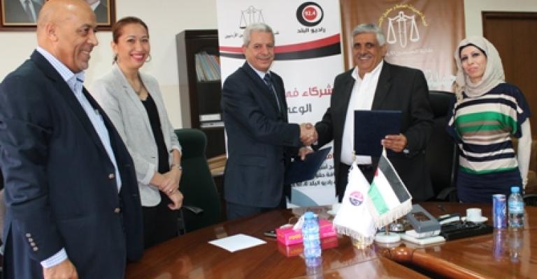 مذكرة تفاهم بين شبكة الاعلام ونقابة المحامين 