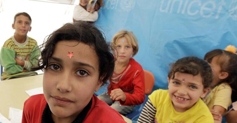 اطفال في مخيم الزعتري للاجئين السوريين - عدسة احمد عبده/ فيسبوك 