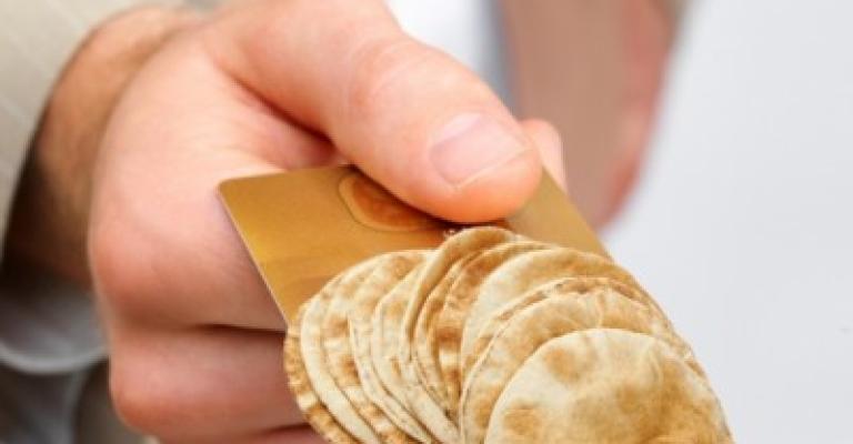محيلان: دعم نقدي بدلا عن البطاقة الذكية للخبز