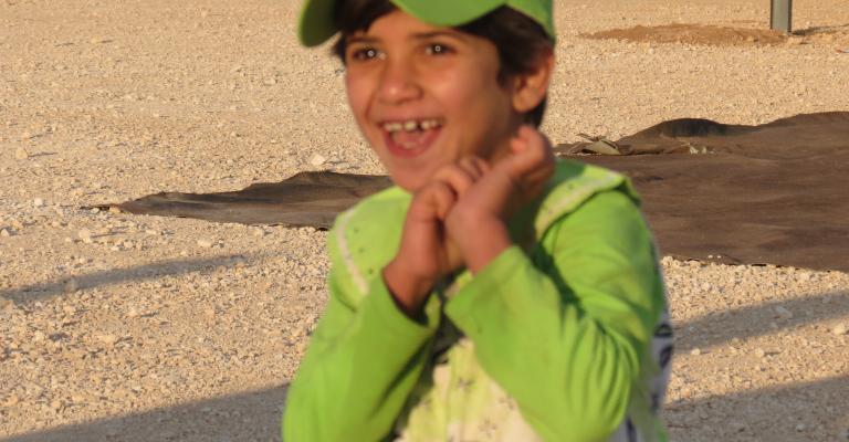 ابتسامة طفل - مخيم الزعتري  - تصوير الاء غزال 