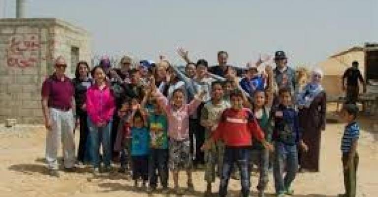 السوريون في الأردن يودعون 2013 بآمال العودة في العام الجديد
