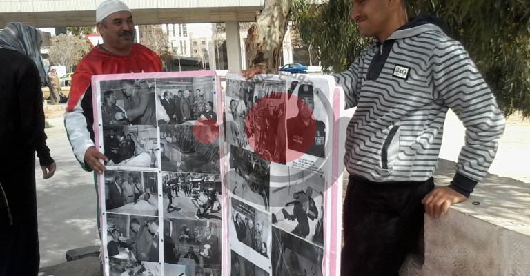 "مؤيدو النظام" يرفعون صور جرحى الأمن على الداخلية - صور