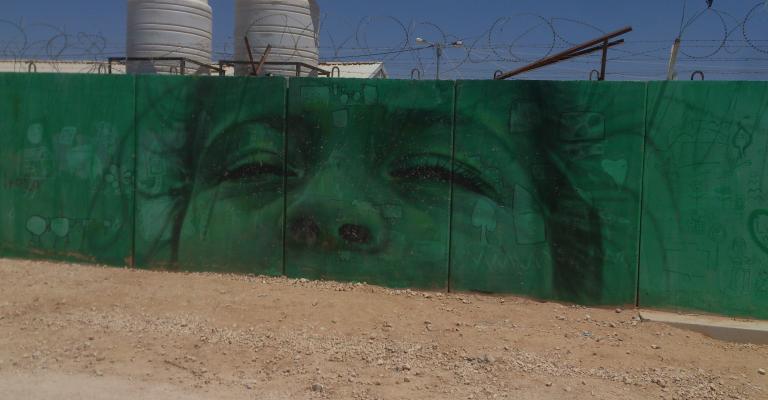 رسم على احد الجدران في مخيم الزعتري / تصوير حزم المازوني