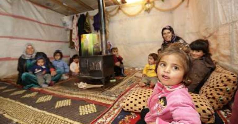 اللاجئون السوريون يجددون أملهم بالعودة مع حلول 2015