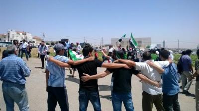 بدء الاقتراع لانتخابات الرئاسة في السفارة السورية..ومعارضون يحتجون