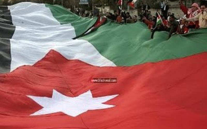 رفع العلم الأردني في "بلعين"