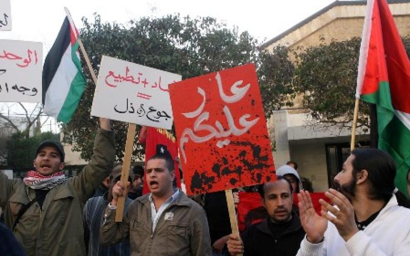 50 Jordanian youth stand in solidarity outside Egypt Embassy in Amman