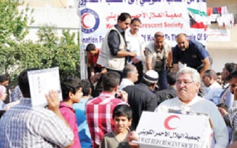 مادبا: توزيع مساعدات عينية على سوريين