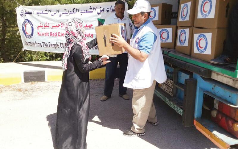 توزيع مساعدات إغاثية على اللاجئين السوريين في معان والعقبة